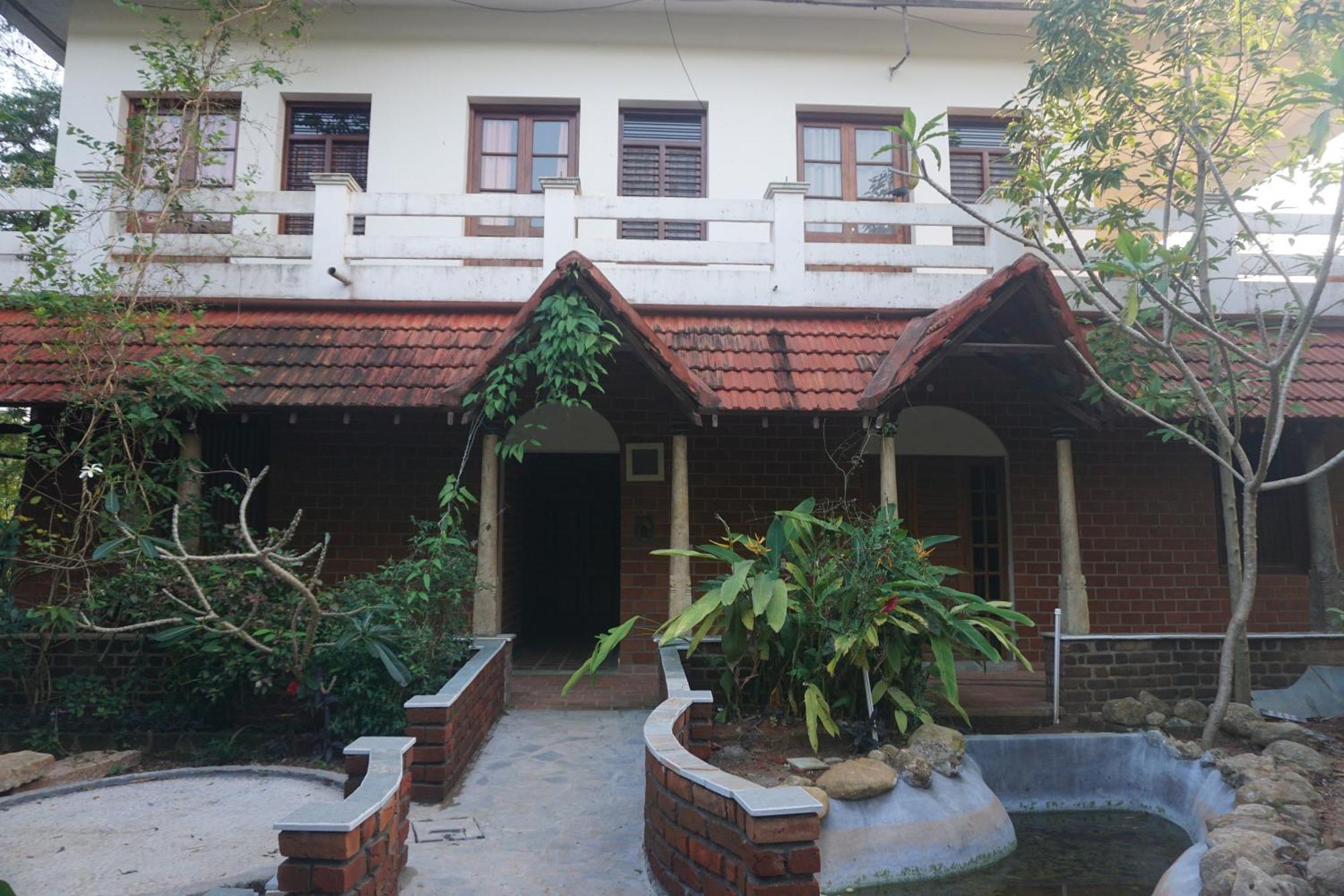 Green'S Guest House Auroville Esterno foto